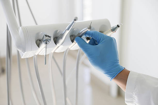 Professional Dental Implants technician working in Red Oaks Mill, NY